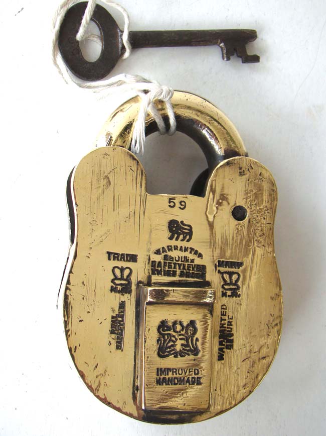 A fine antique English brass Padlock stamped "Warranted secure Safety Lever Thief Proof" circa 1860